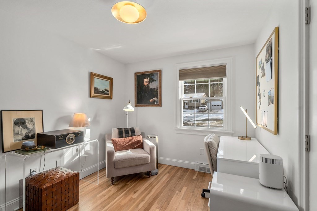193 Gorwin Drive Holliston, MA 01746 - Photo 14 of 23 a living room with furniture and a window