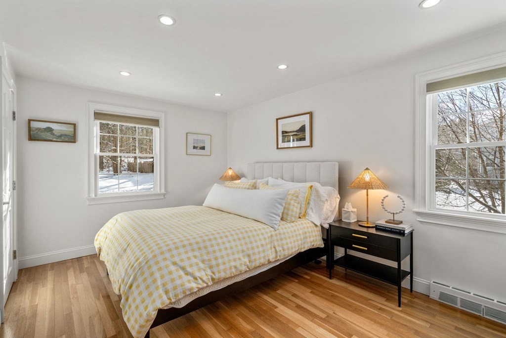 193 Gorwin Drive Holliston, MA 01746 - Photo 15 of 23 a bedroom with a bed and wooden floor