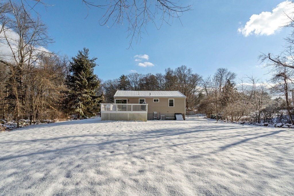 193 Gorwin Drive Holliston, MA 01746 - Photo 21 of 23 a house with trees in the background
