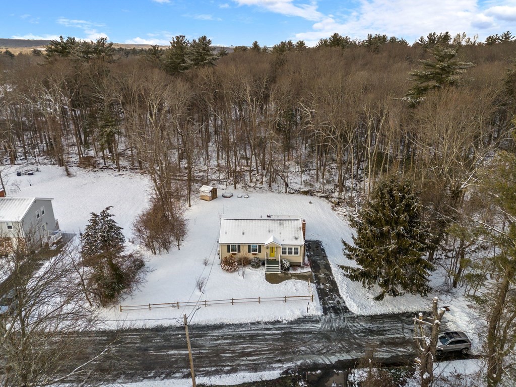 193 Gorwin Drive Holliston, MA 01746 - Photo 3 of 23 a view of a town with mountains in the background