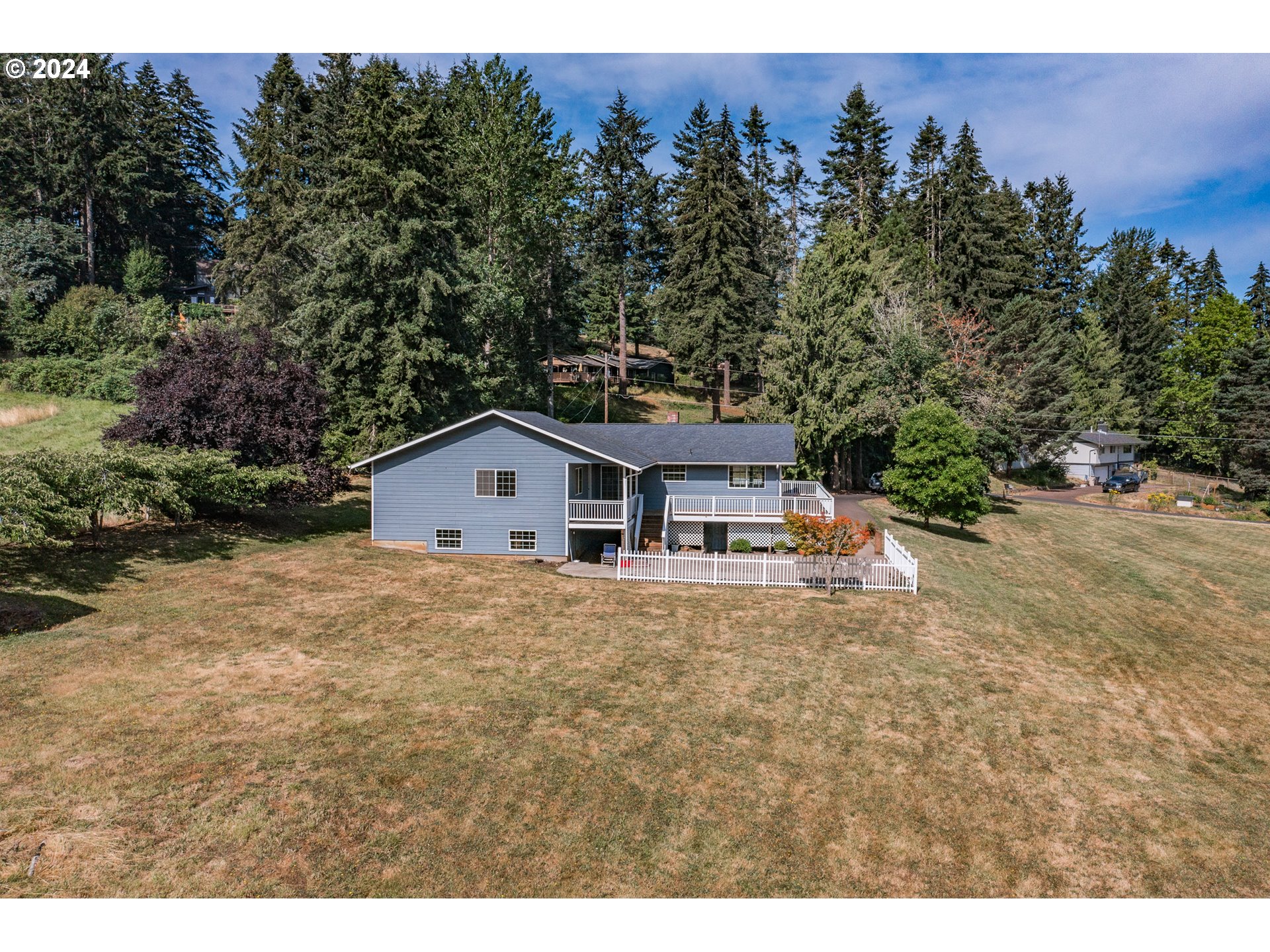 30521 Rancho Road Lebanon, OR 97355 - Photo 36 of 39 a view of a house with a outdoor space