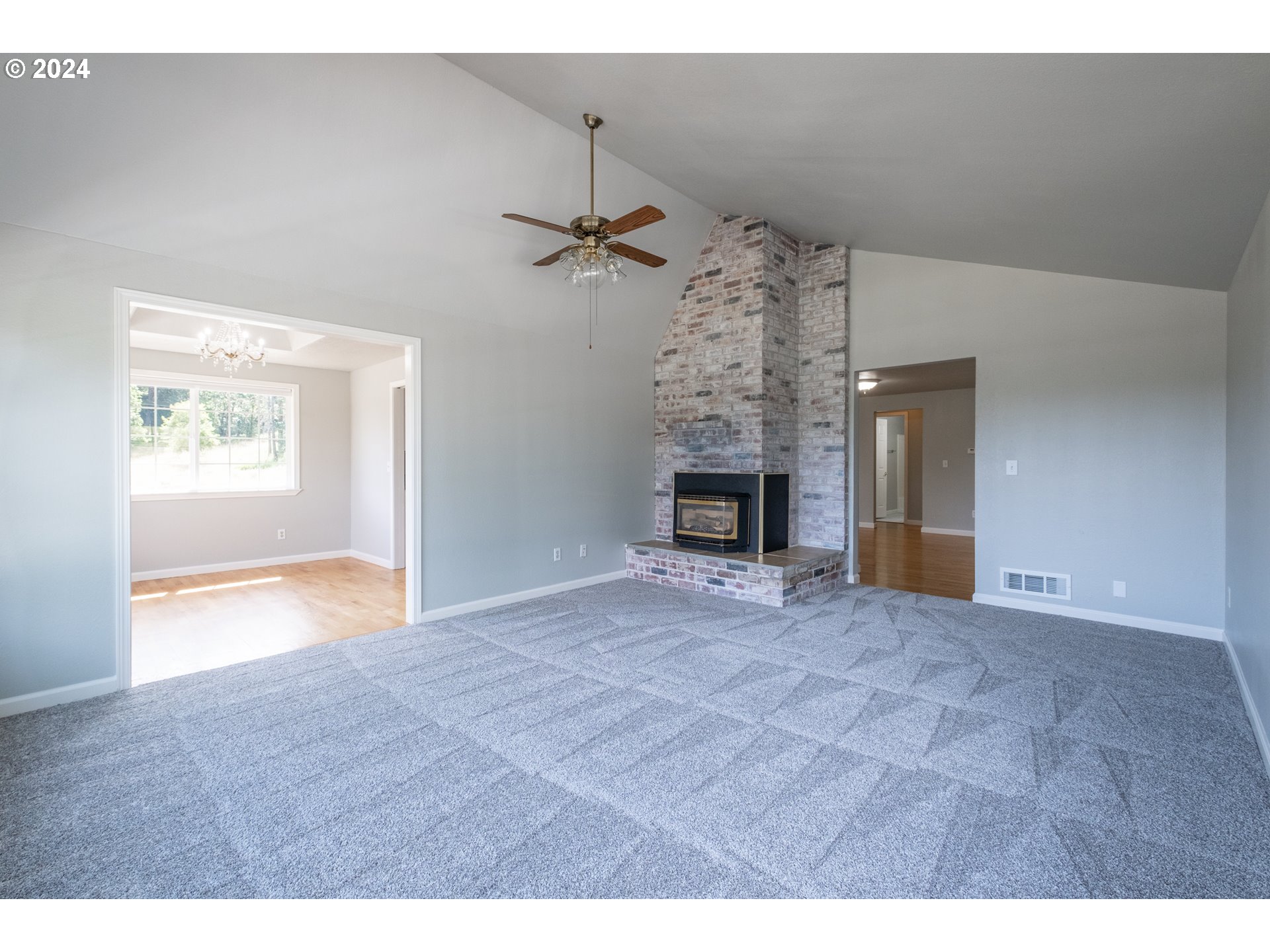 30521 Rancho Road Lebanon, OR 97355 - Photo 6 of 39 a view of empty room with a fireplace
