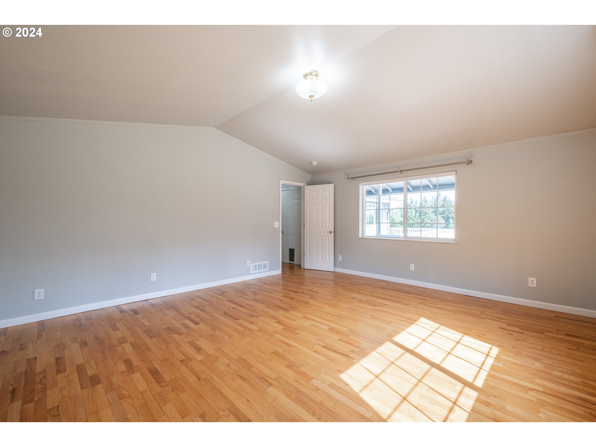 30521 Rancho Road Lebanon, OR 97355 - Photo 8 of 39 a view of an empty room with a window