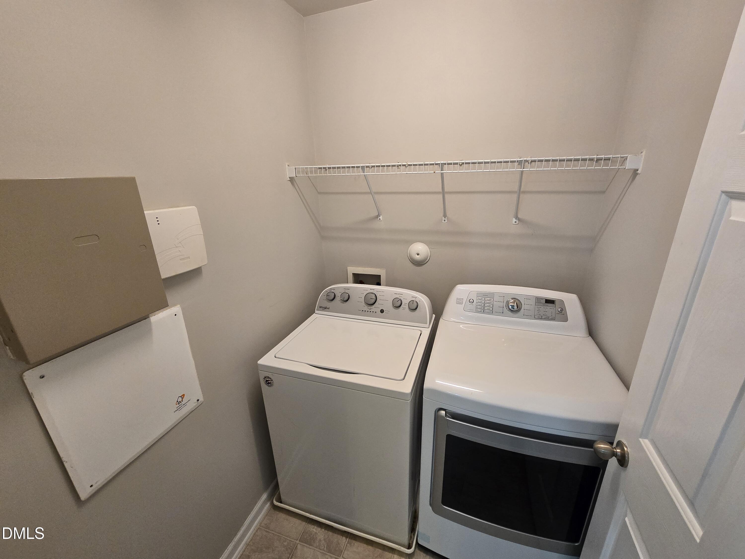 5030 Reservoir Road Raleigh, NC 27610 - Photo 21 of 31 a utility room with dryer and washer