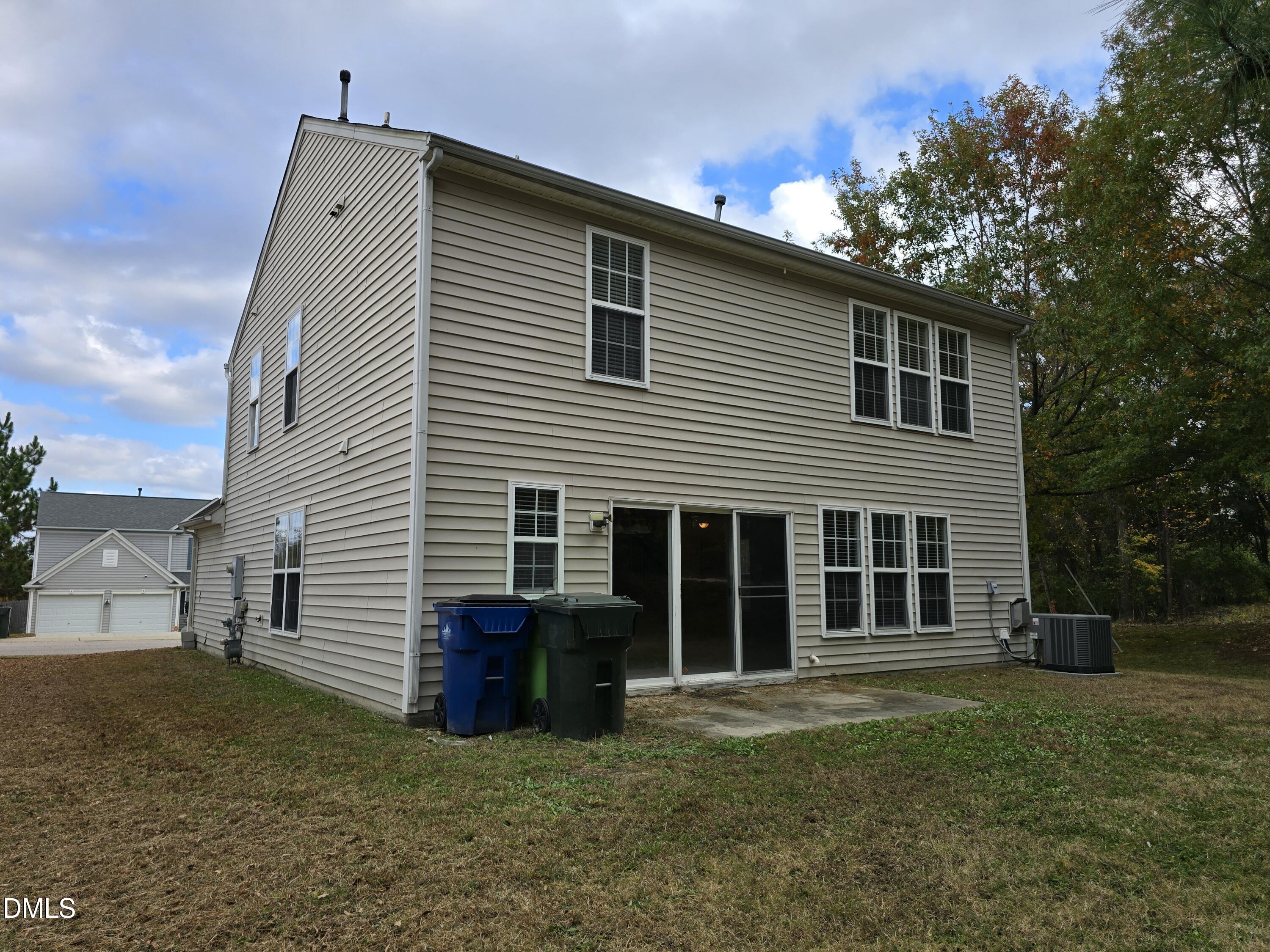5030 Reservoir Road Raleigh, NC 27610 - Photo 5 of 31 a view of a house with a yard