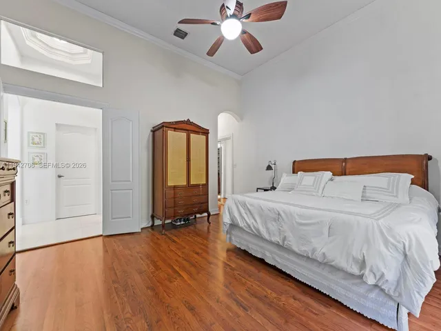 a view of a dining room with furniture and a window