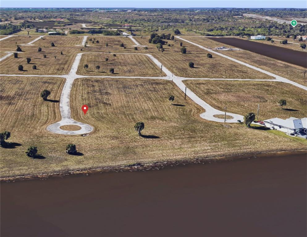 9 Laurel Court Placida, FL 33946 - Photo 7 of 10 an aerial view of a residential houses with outdoor space