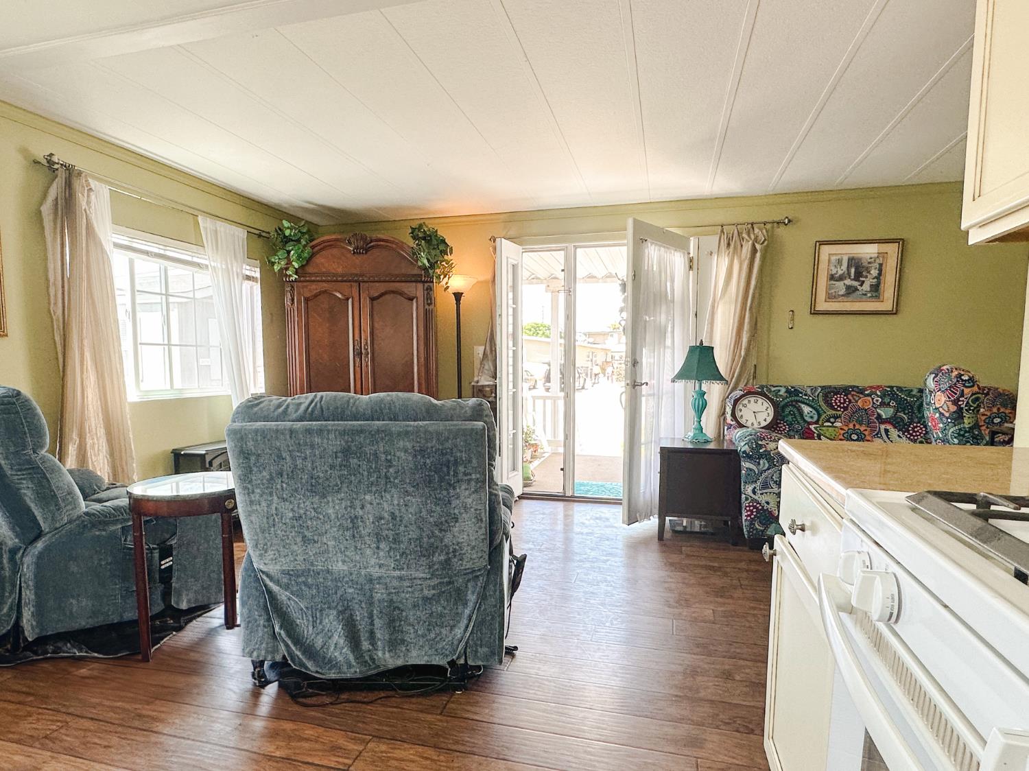 1146 Birch Avenue, Unit 19 Seaside, CA 93955 - Photo 7 of 20 a living room with furniture and large windows