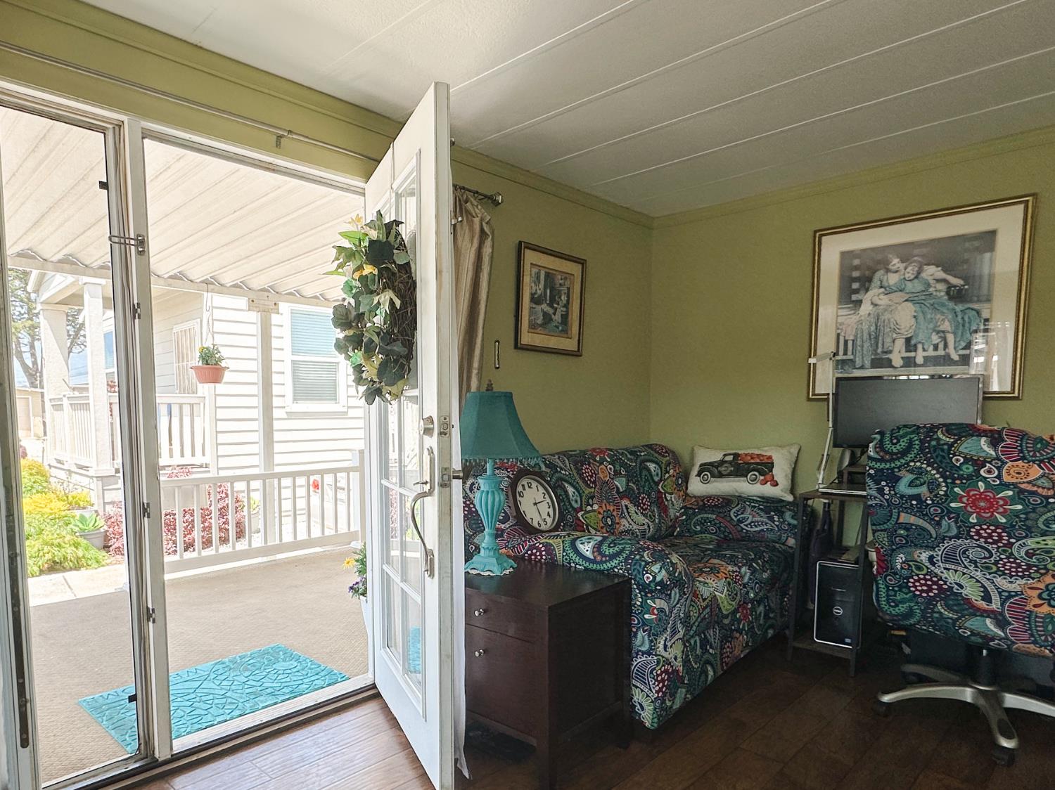 1146 Birch Avenue, Unit 19 Seaside, CA 93955 - Photo 8 of 20 a living room with furniture and a floor to ceiling window