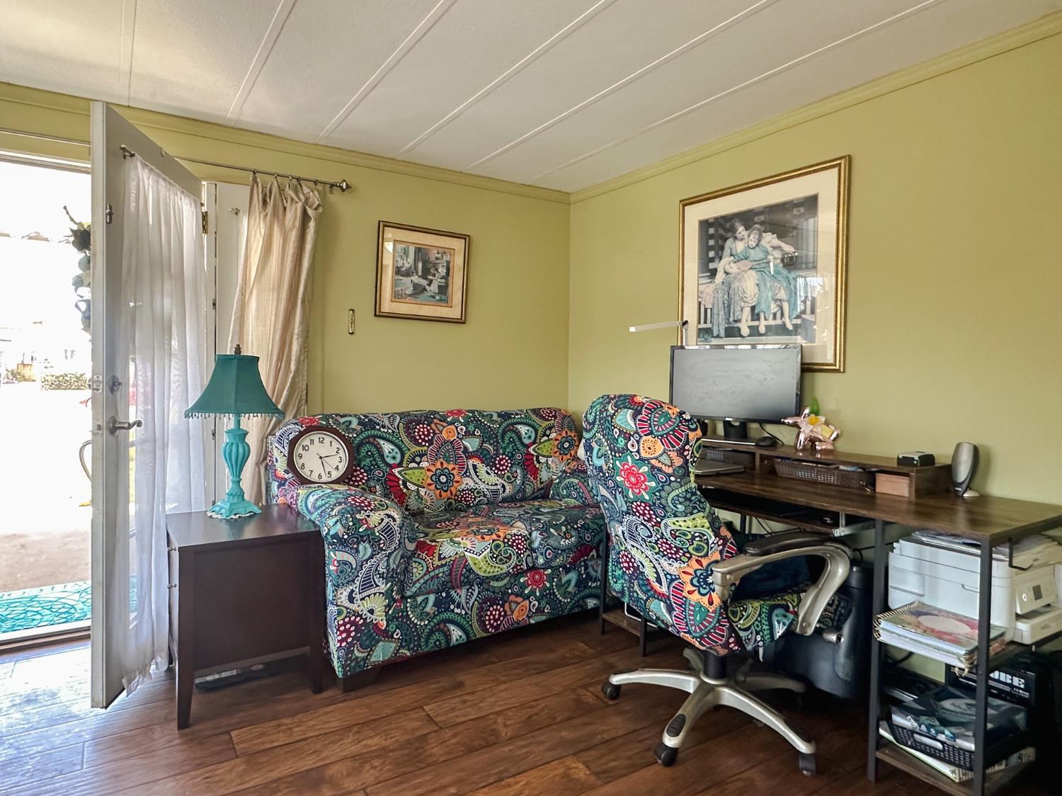 1146 Birch Avenue, Unit 19 Seaside, CA 93955 - Photo 9 of 20 a view of a workspace with furniture and a window