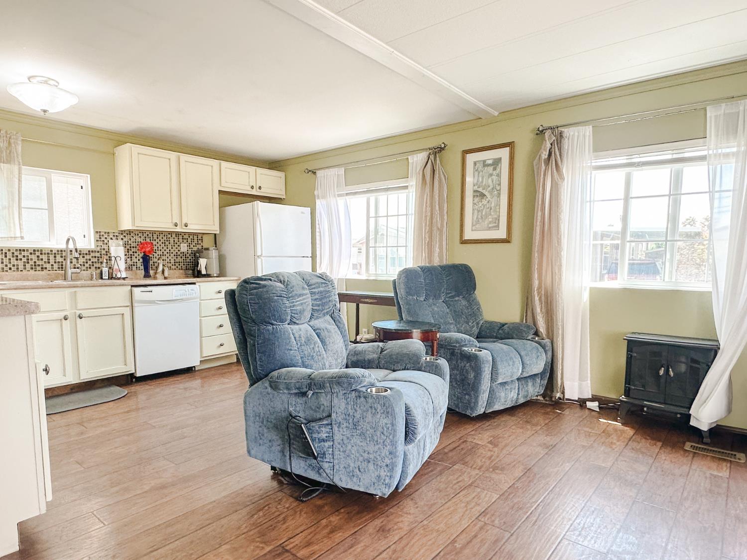 1146 Birch Avenue, Unit 19 Seaside, CA 93955 - Photo 10 of 20 a living room with furniture and a fireplace