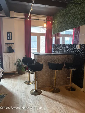 a view of a chairs and table in a room