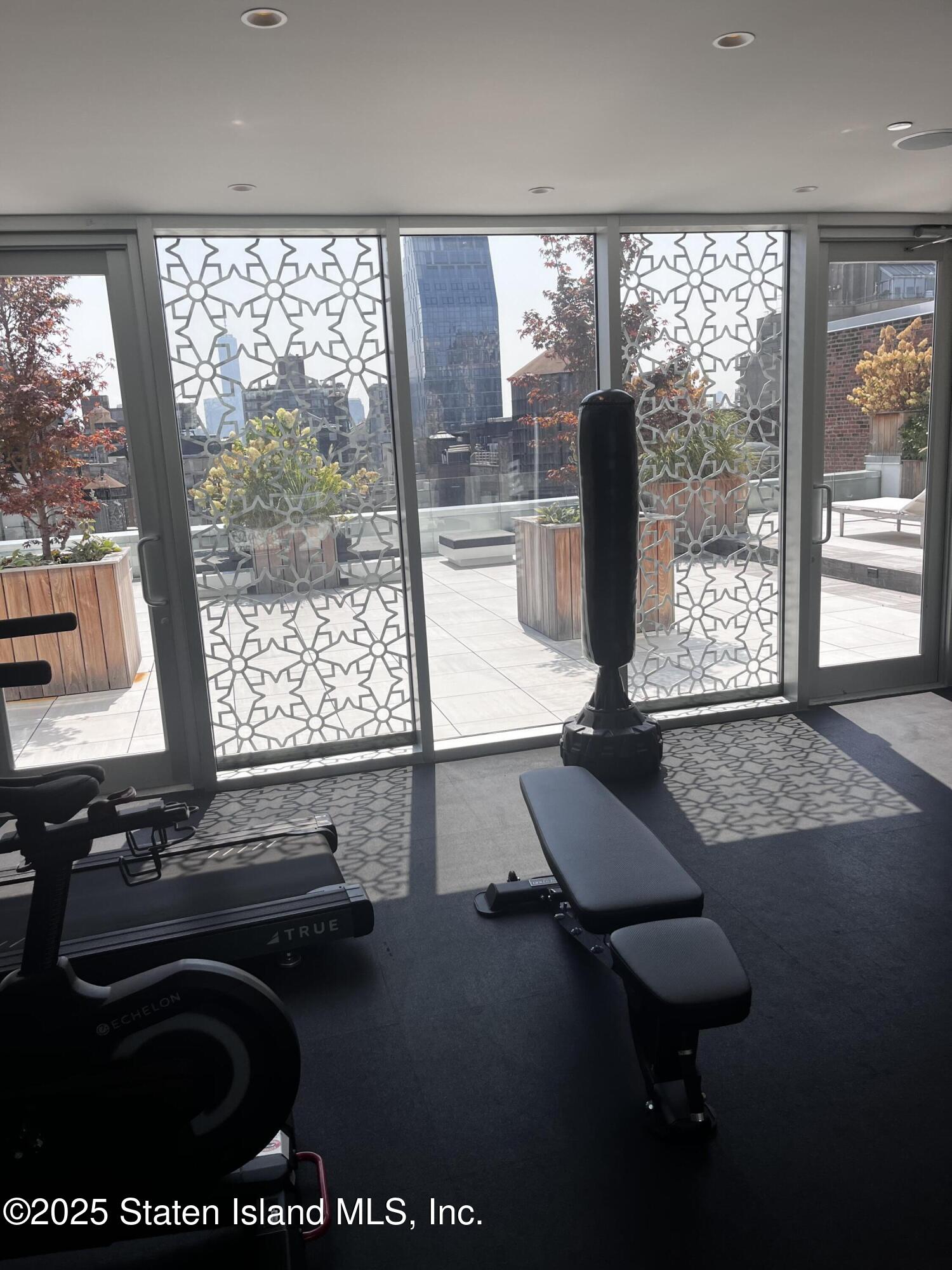 16 West 19th Street, Unit 9F Manhattan, NY 10011 - Photo 22 of 32 a room with pool table and windows