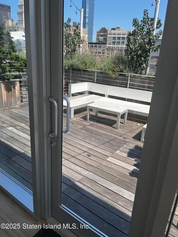 a room with furniture and a flat screen tv