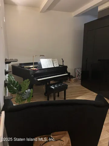 a view of a balcony with chairs