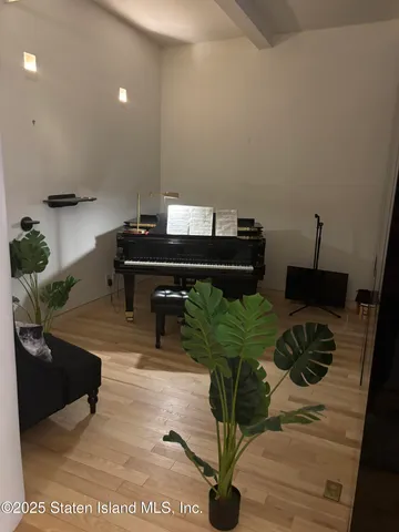 a living room with furniture and a table