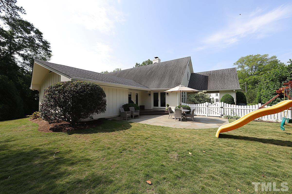 410 Marlowe Road Raleigh, NC 27609 - Photo 20 of 23 a view of a house with swimming pool and sitting area