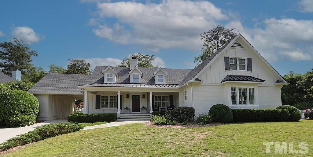 410 Marlowe Road Raleigh, NC 27609 - Photo 23 of 23 a front view of a house with garden and porch