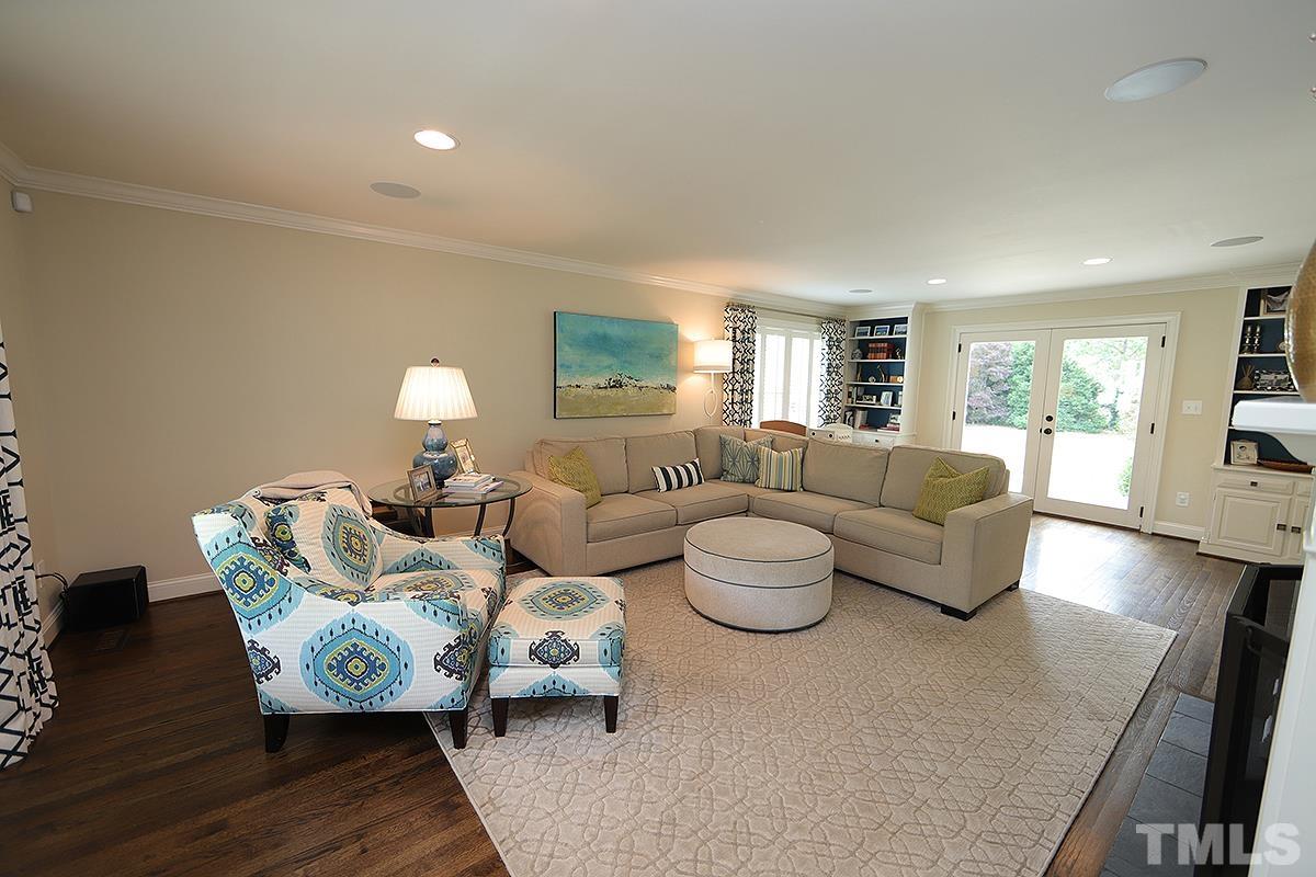 410 Marlowe Road Raleigh, NC 27609 - Photo 8 of 23 a living room with couches and a couch with wooden floor