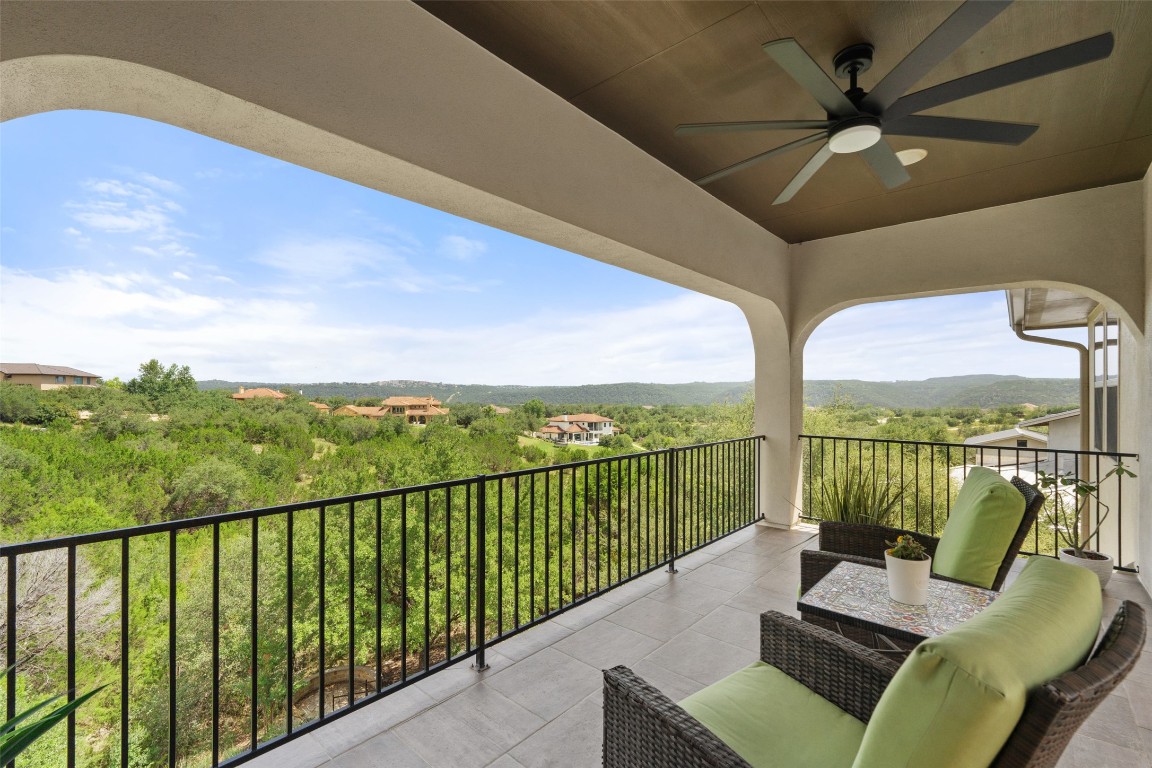 13009 Zen Gardens Way Austin, TX 78732 - Photo 34 of 40 a balcony with furniture