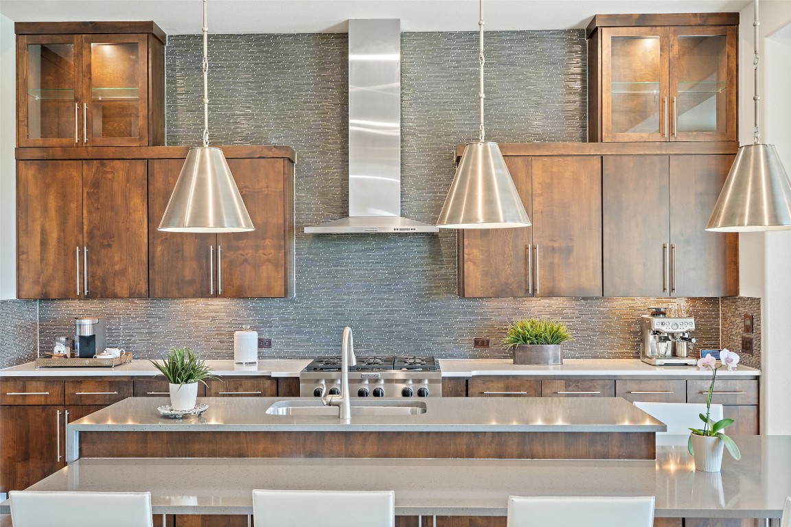 13009 Zen Gardens Way Austin, TX 78732 - Photo 8 of 40 a kitchen with a sink and a window