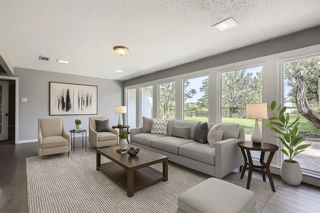 8 Canyon Ridge Drive Fate, TX 75087 - Photo 13 of 40 a living room with furniture and a large window