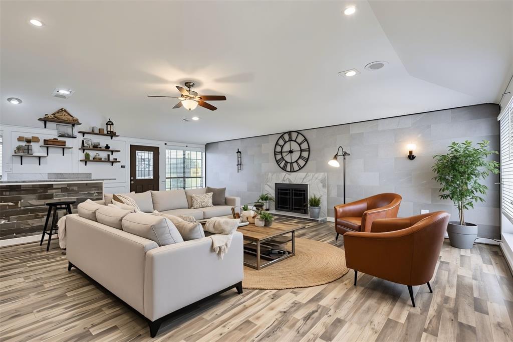 8 Canyon Ridge Drive Fate, TX 75087 - Photo 15 of 40 a living room with furniture and a chandelier