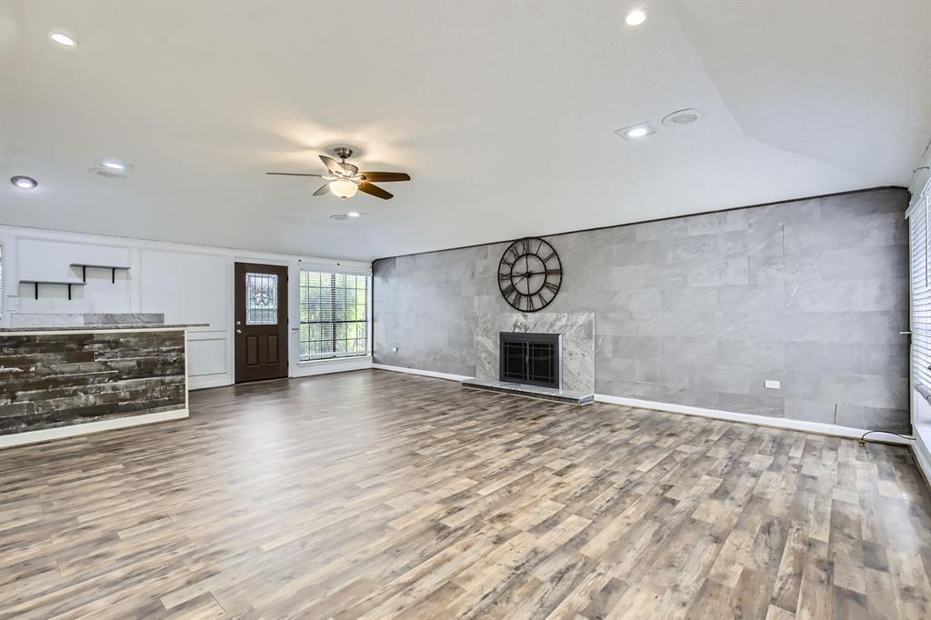 8 Canyon Ridge Drive Fate, TX 75087 - Photo 16 of 40 a view of a kitchen with a sink and a stove top oven