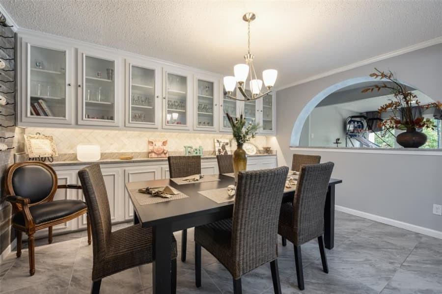 8 Canyon Ridge Drive Fate, TX 75087 - Photo 2 of 40 a view of a dining room with furniture a chandelier and wooden floor