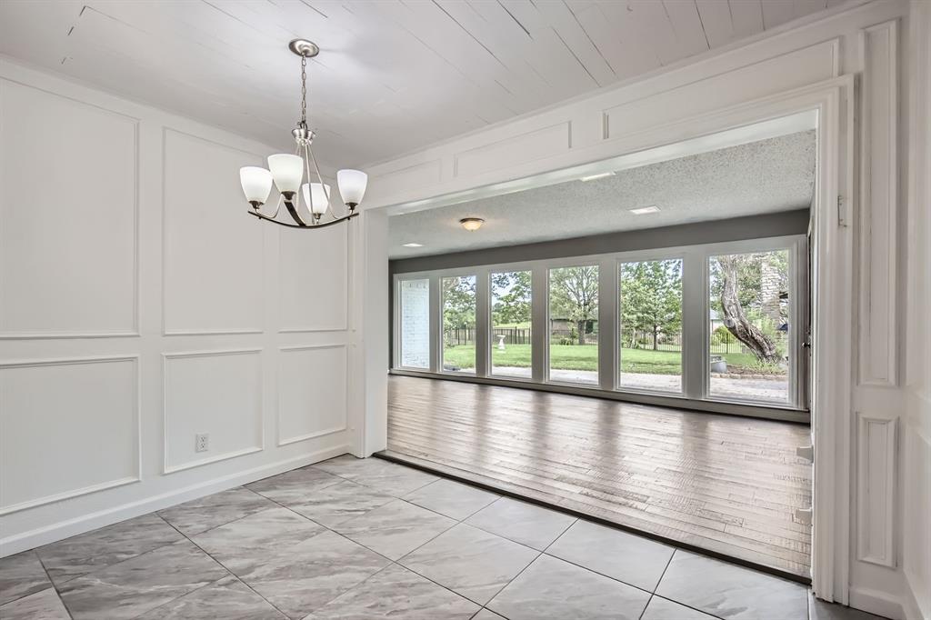 8 Canyon Ridge Drive Fate, TX 75087 - Photo 25 of 40 a view of empty room with wooden floor and fan