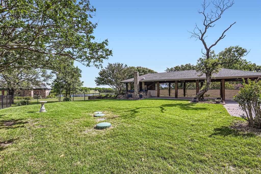 8 Canyon Ridge Drive Fate, TX 75087 - Photo 38 of 40 a view of a house with a big yard