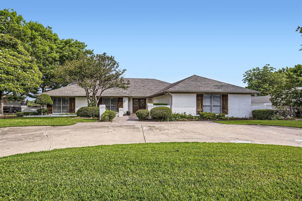 8 Canyon Ridge Drive Fate, TX 75087 - Photo 9 of 40 a front view of a house with a yard and garage
