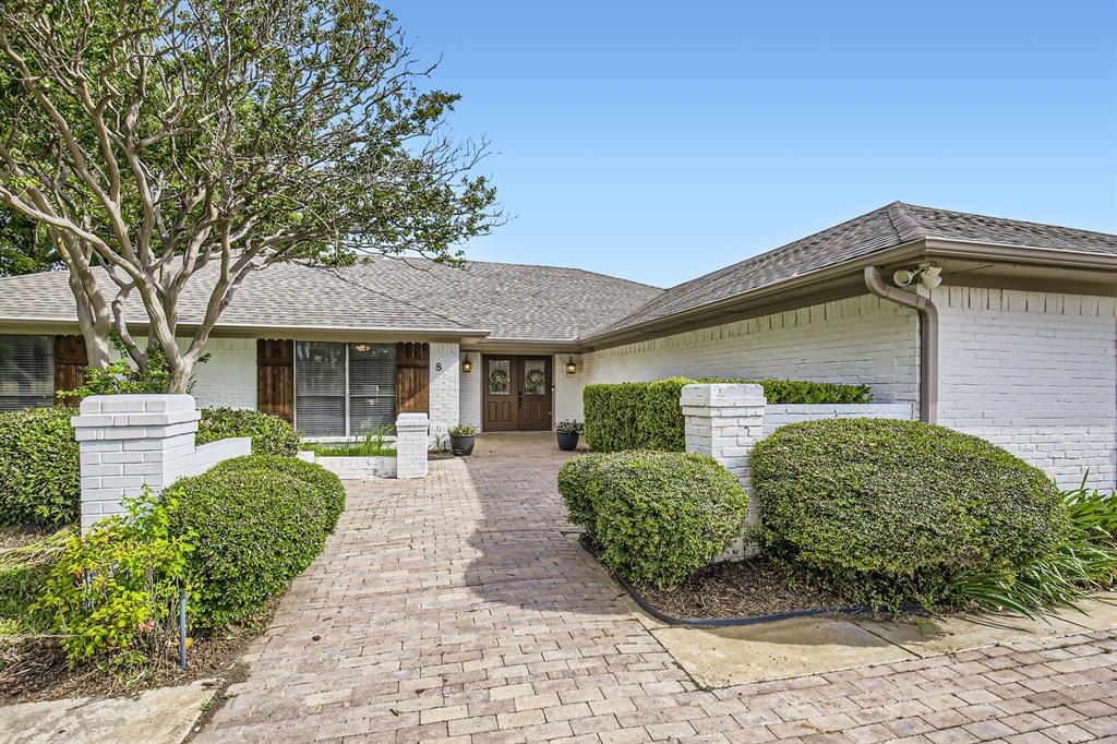 8 Canyon Ridge Drive Fate, TX 75087 - Photo 10 of 40 a front view of a house with garden