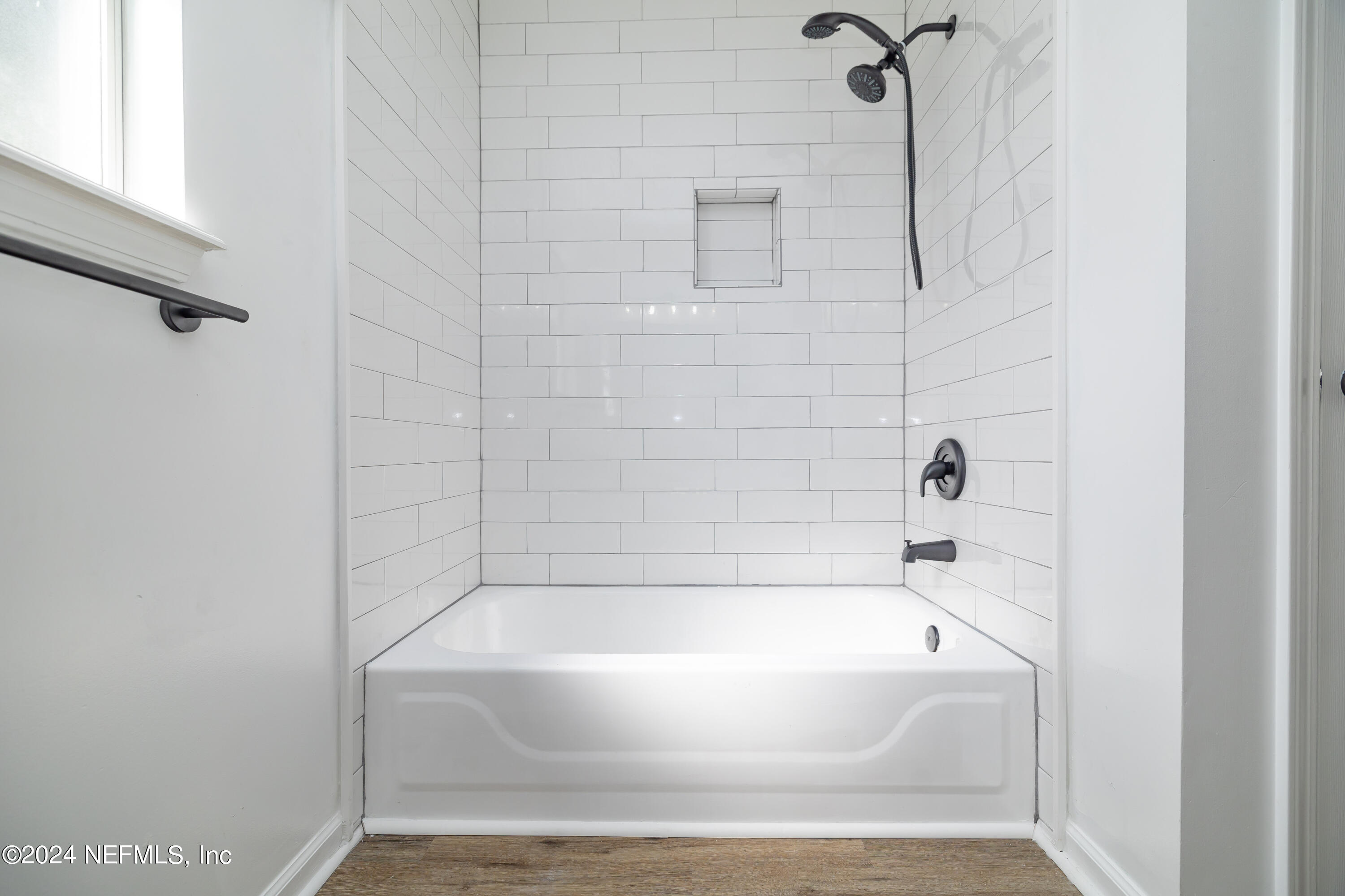 620 Morning Mist Way Orange Park, FL 32073 - Photo 17 of 34 a bathroom with a bathtub