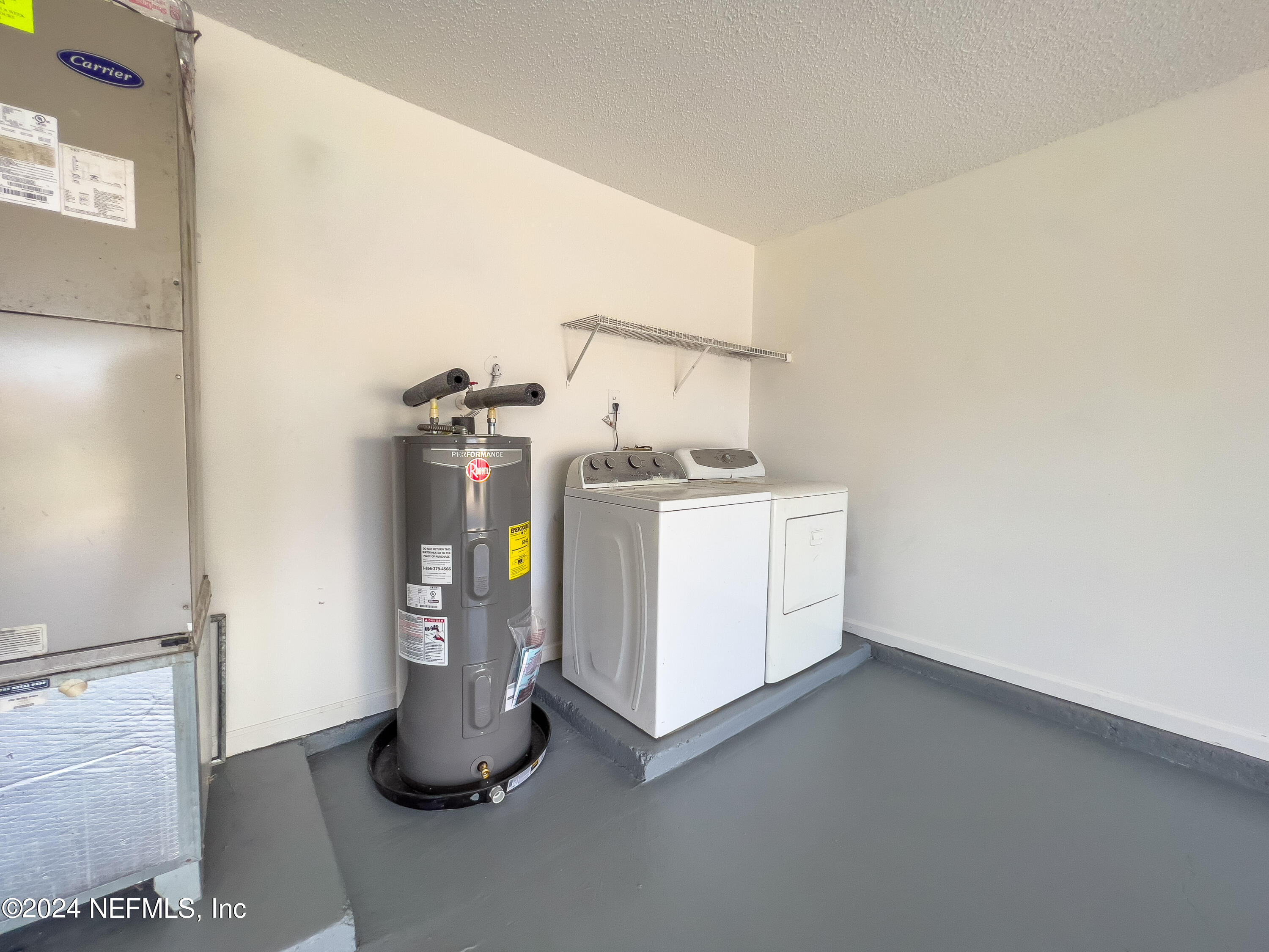 620 Morning Mist Way Orange Park, FL 32073 - Photo 26 of 34 a utility room with dryer and washer
