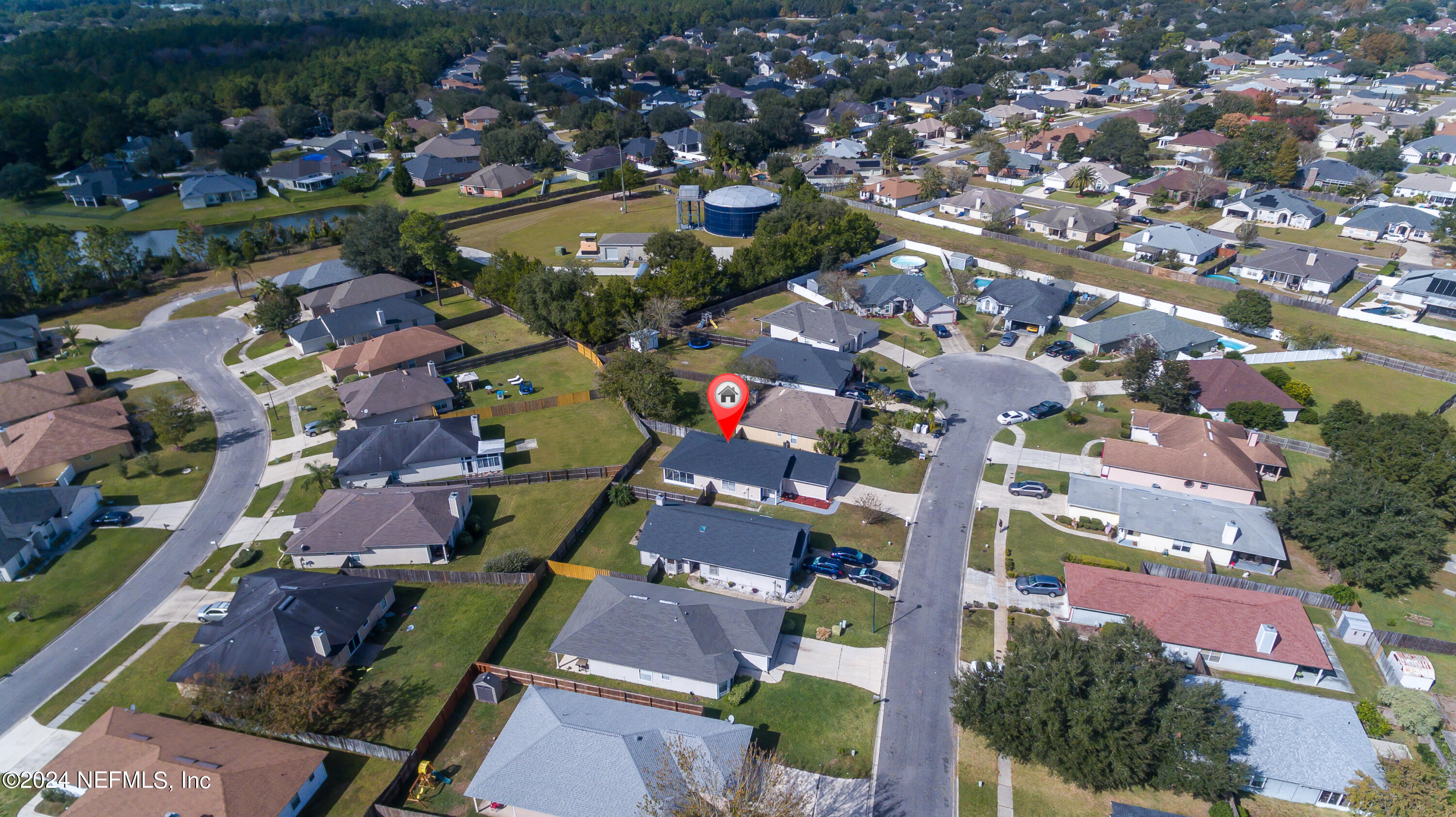 620 Morning Mist Way Orange Park, FL 32073 - Photo 29 of 34 an aerial view of residential houses with outdoor space
