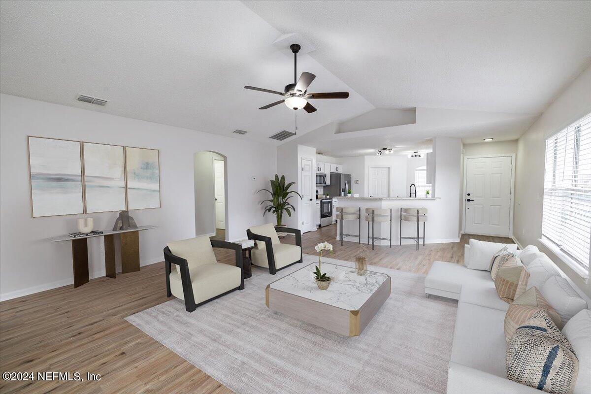 620 Morning Mist Way Orange Park, FL 32073 - Photo 10 of 34 a living room with furniture