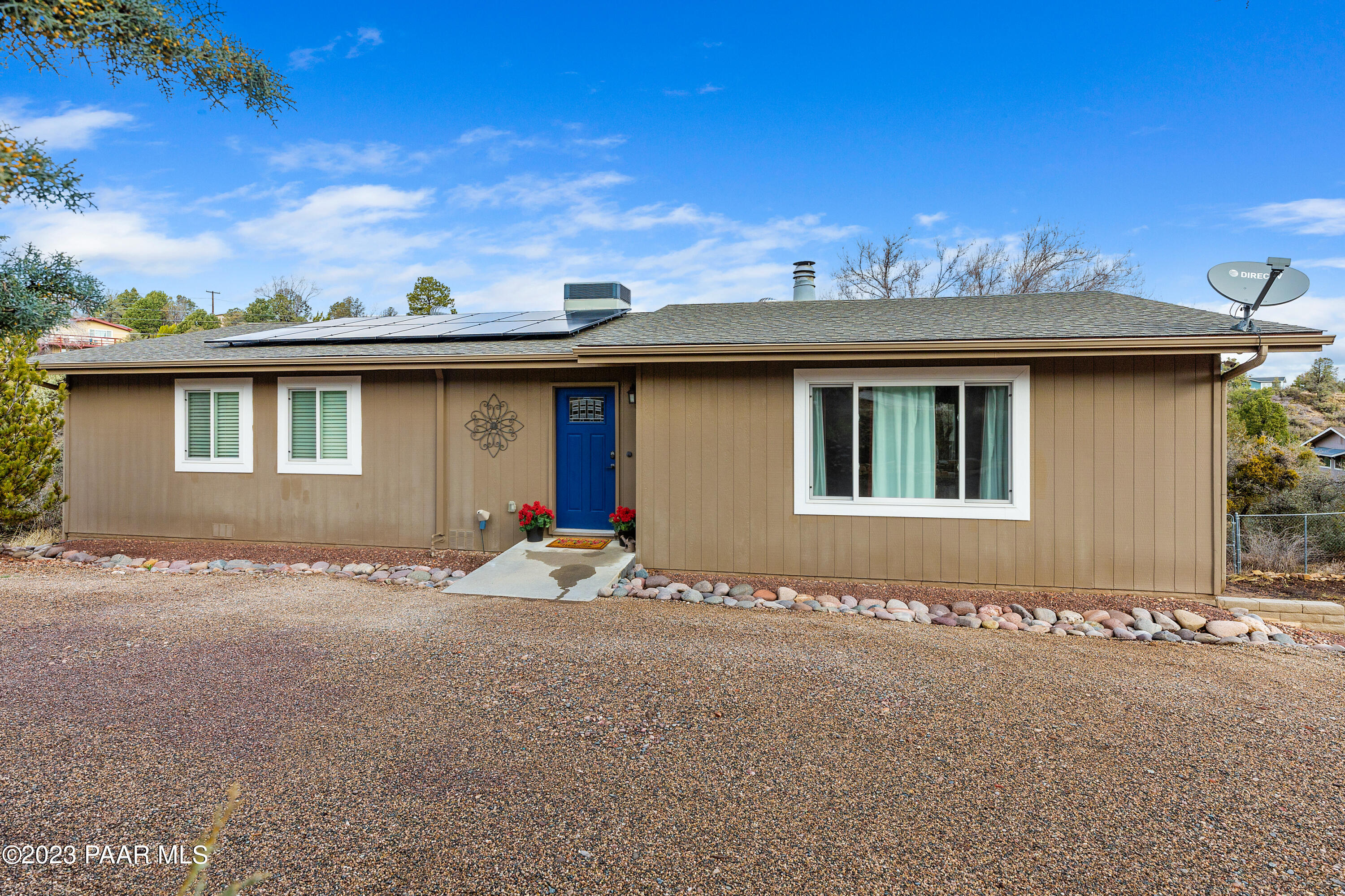 450 Valley Place Prescott, AZ 86301 - Photo 1 of 44 a front view of a house with a yard