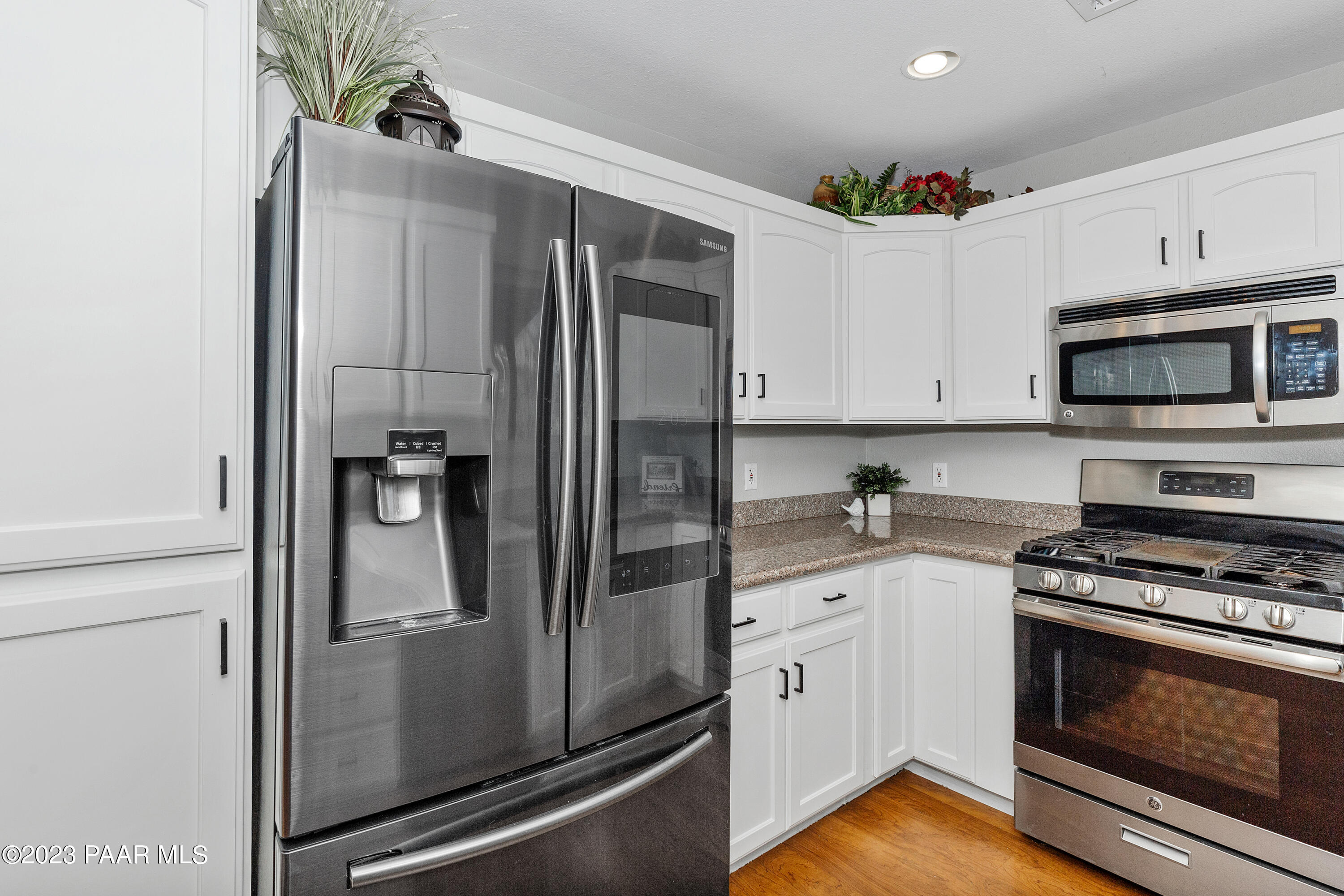 450 Valley Place Prescott, AZ 86301 - Photo 13 of 44 a kitchen with a refrigerator stove and microwave
