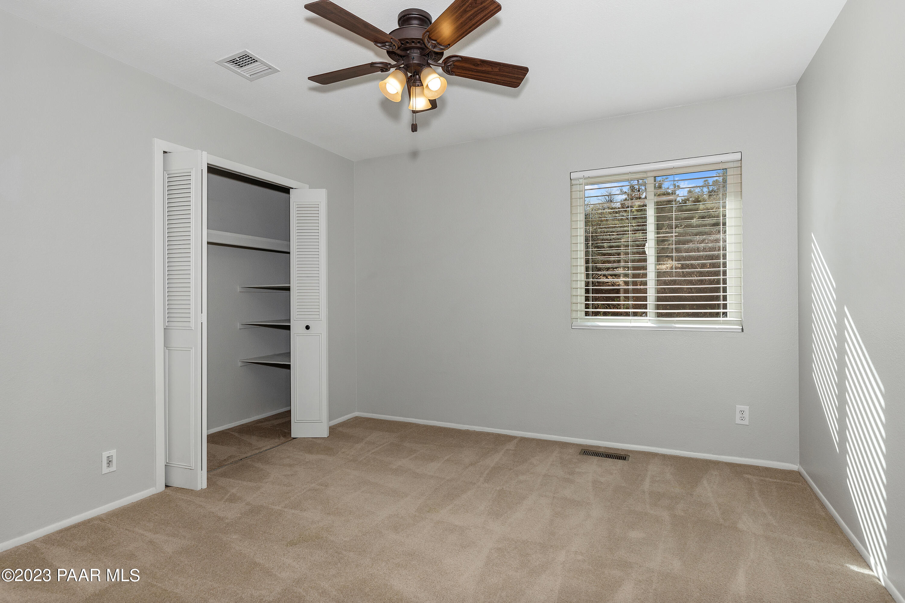 450 Valley Place Prescott, AZ 86301 - Photo 18 of 44 a view of an empty room with a window