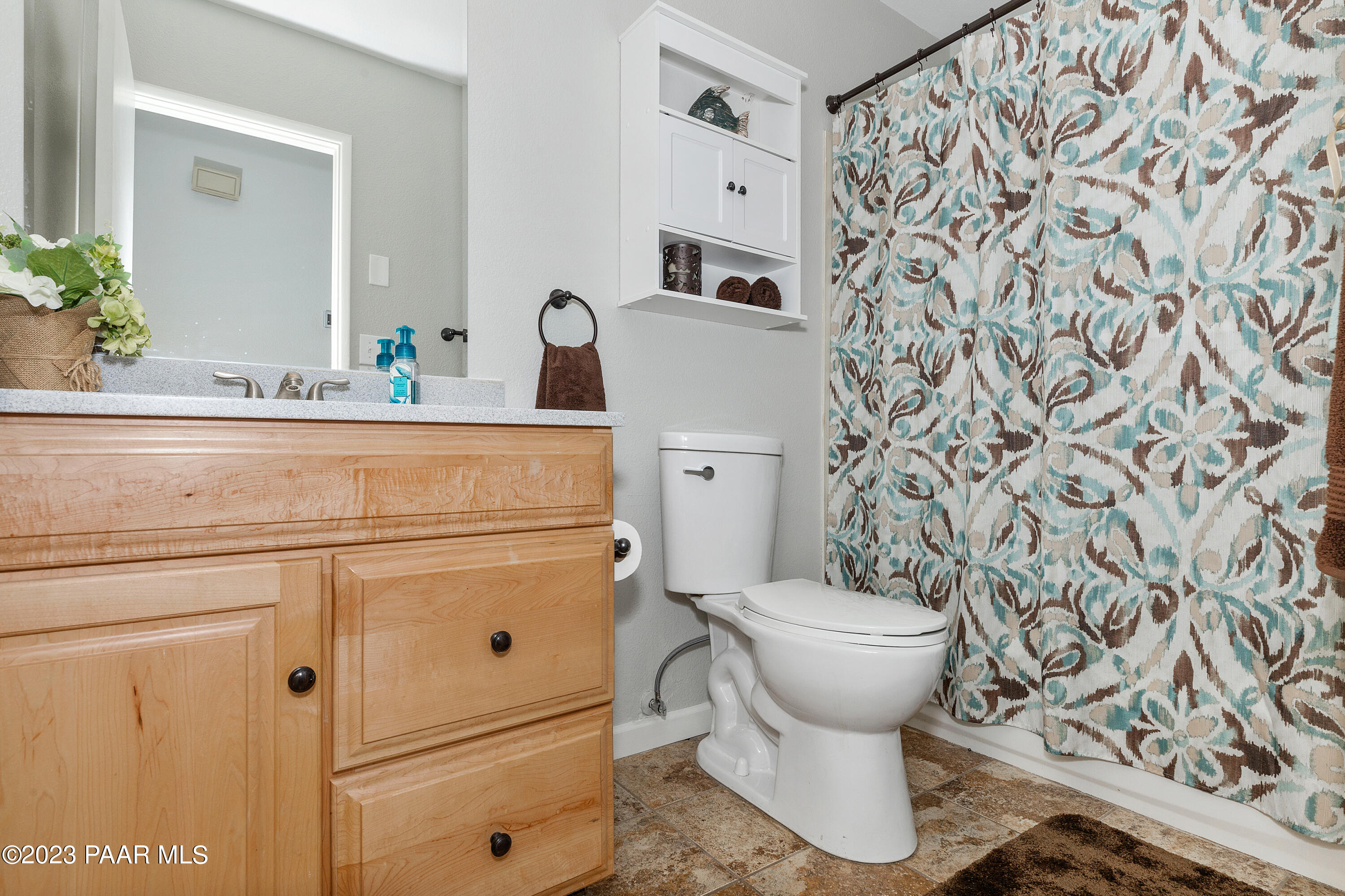 450 Valley Place Prescott, AZ 86301 - Photo 20 of 44 a bathroom with a sink and mirror with toilet