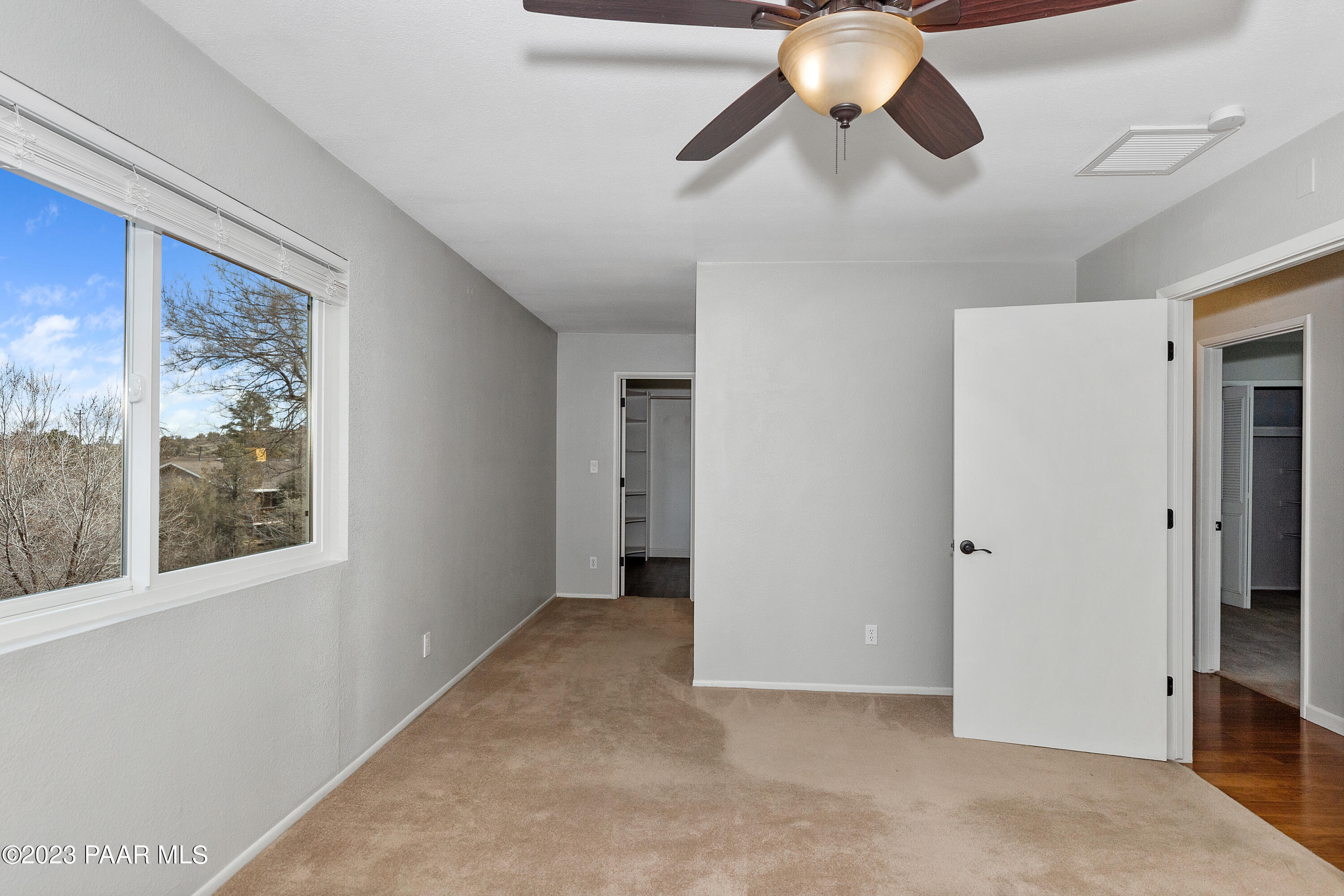 450 Valley Place Prescott, AZ 86301 - Photo 24 of 44 a view of a room with a ceiling fan and window