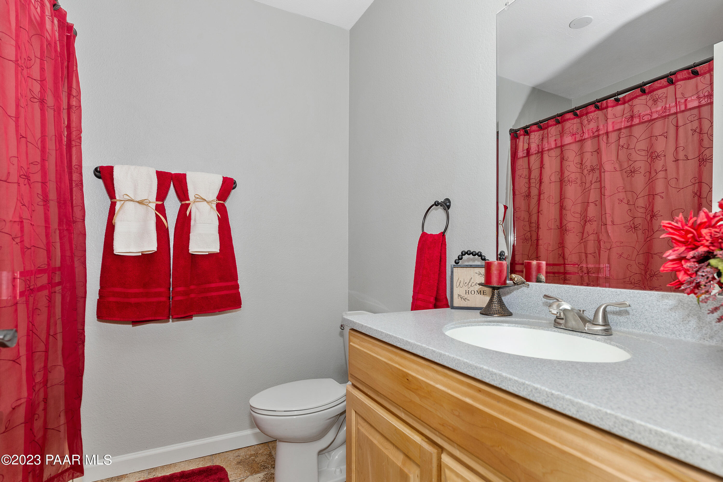450 Valley Place Prescott, AZ 86301 - Photo 25 of 44 a bathroom with a sink and a mirror