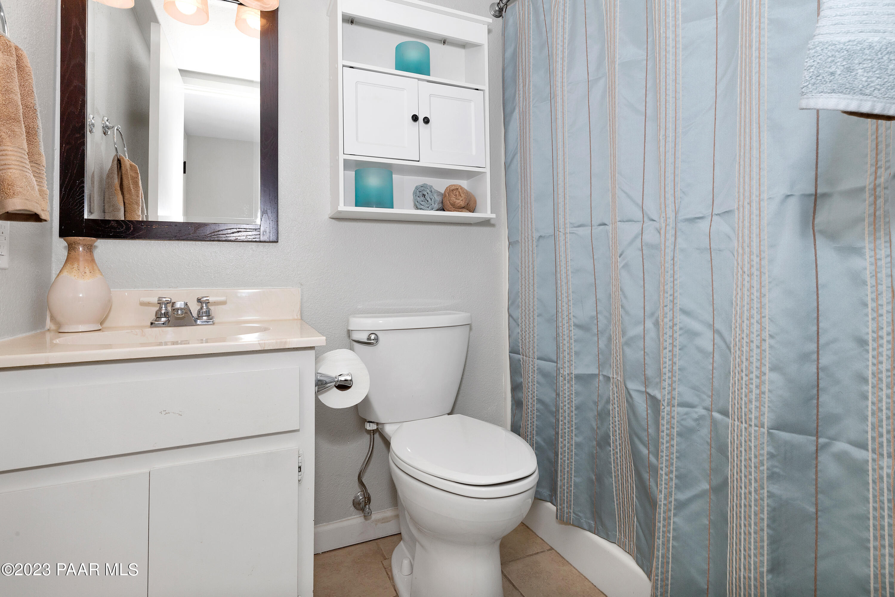450 Valley Place Prescott, AZ 86301 - Photo 29 of 44 a bathroom with a toilet sink and mirror