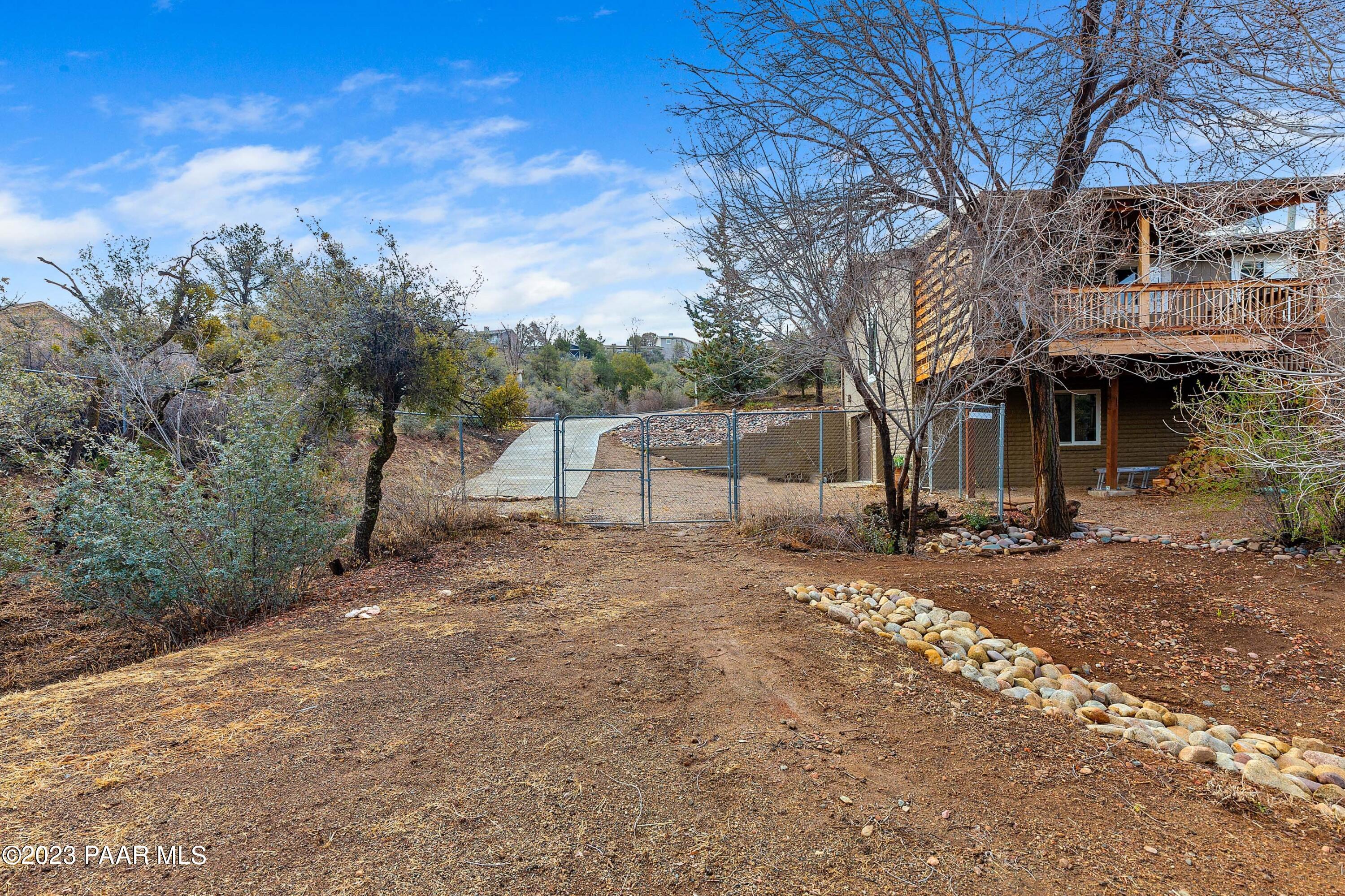 450 Valley Place Prescott, AZ 86301 - Photo 34 of 44 a view of a house with a yard