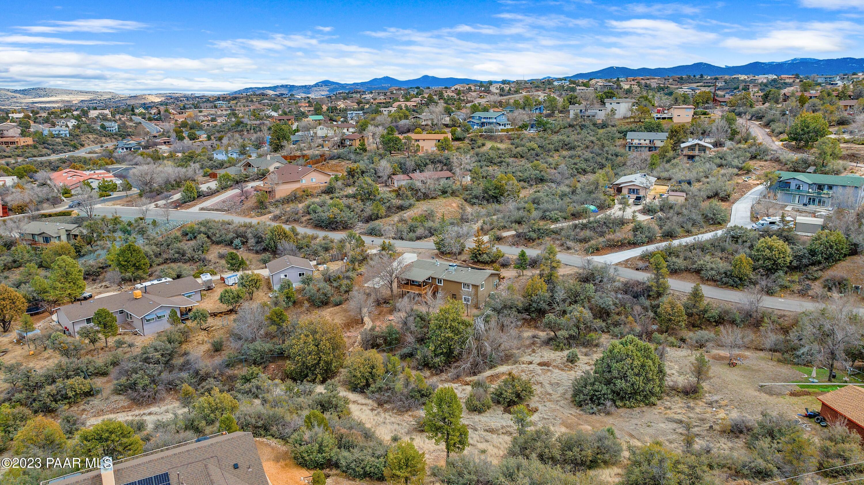 450 Valley Place Prescott, AZ 86301 - Photo 4 of 44 an aerial view of residential houses with outdoor space and trees