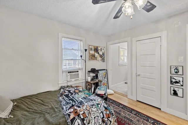 a white toilet sitting next to a bathroom sink