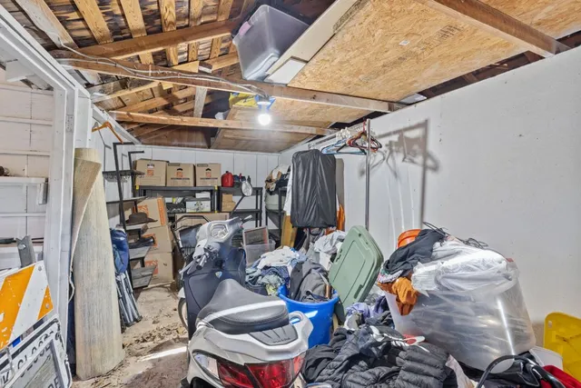 a pathway of a house with a yard