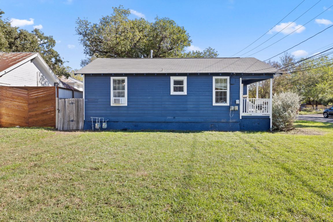 1202 East 29th Street, Unit A Austin, TX 78722 - Photo 3 of 37 View of home's exterior with a yard and a porch