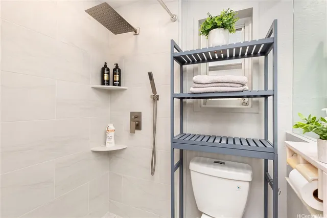 a kitchen with a refrigerator and a sink